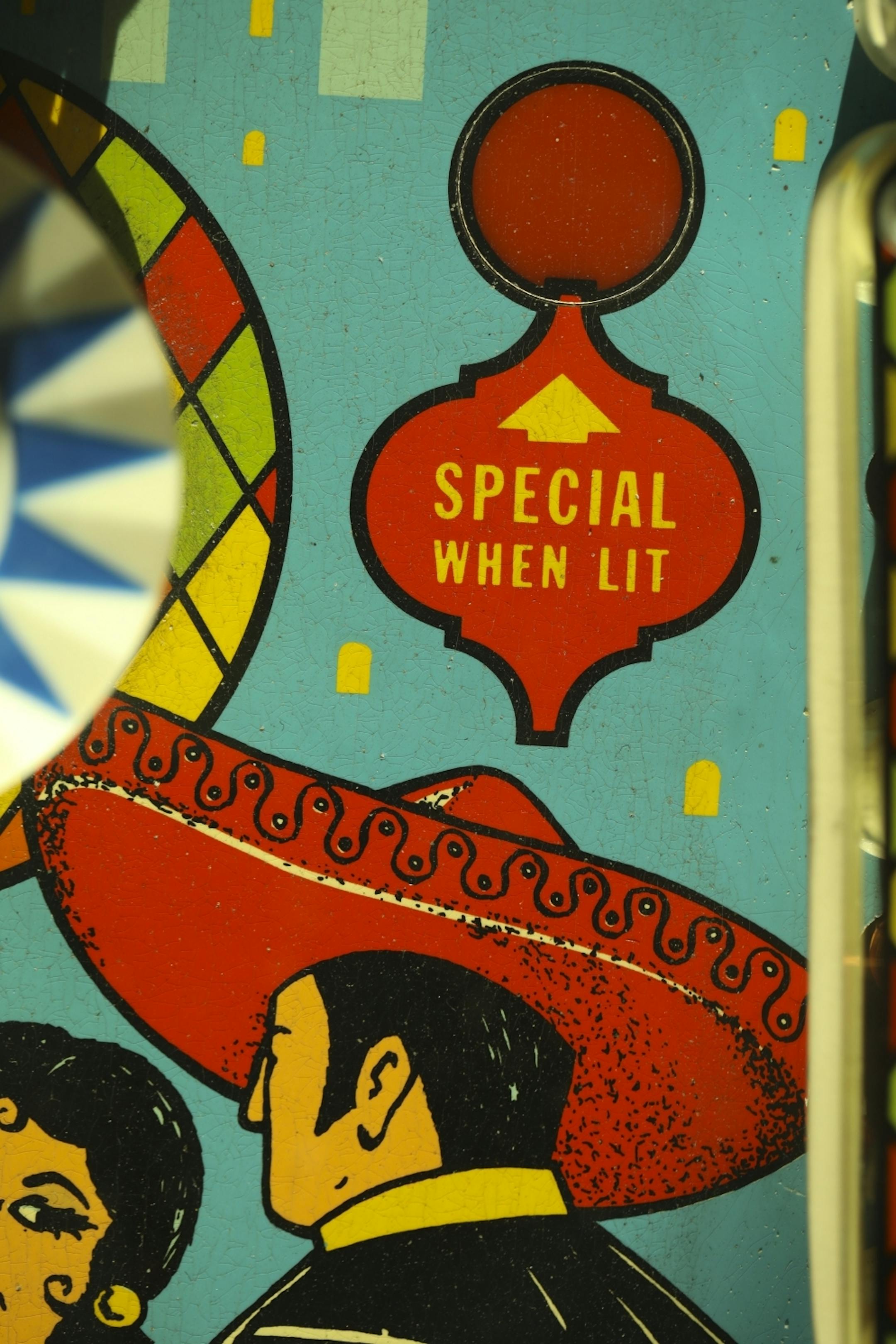 Detail from the playing surface of the pinball machine Amigo.