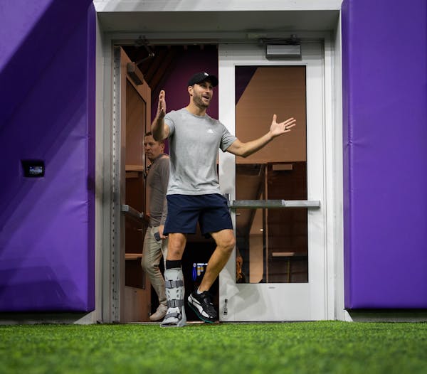 For the first time since tearing his achilles tendon, Minnesota Vikings quarterback Kirk Cousins speaks at a press conference at the TCO Performance C