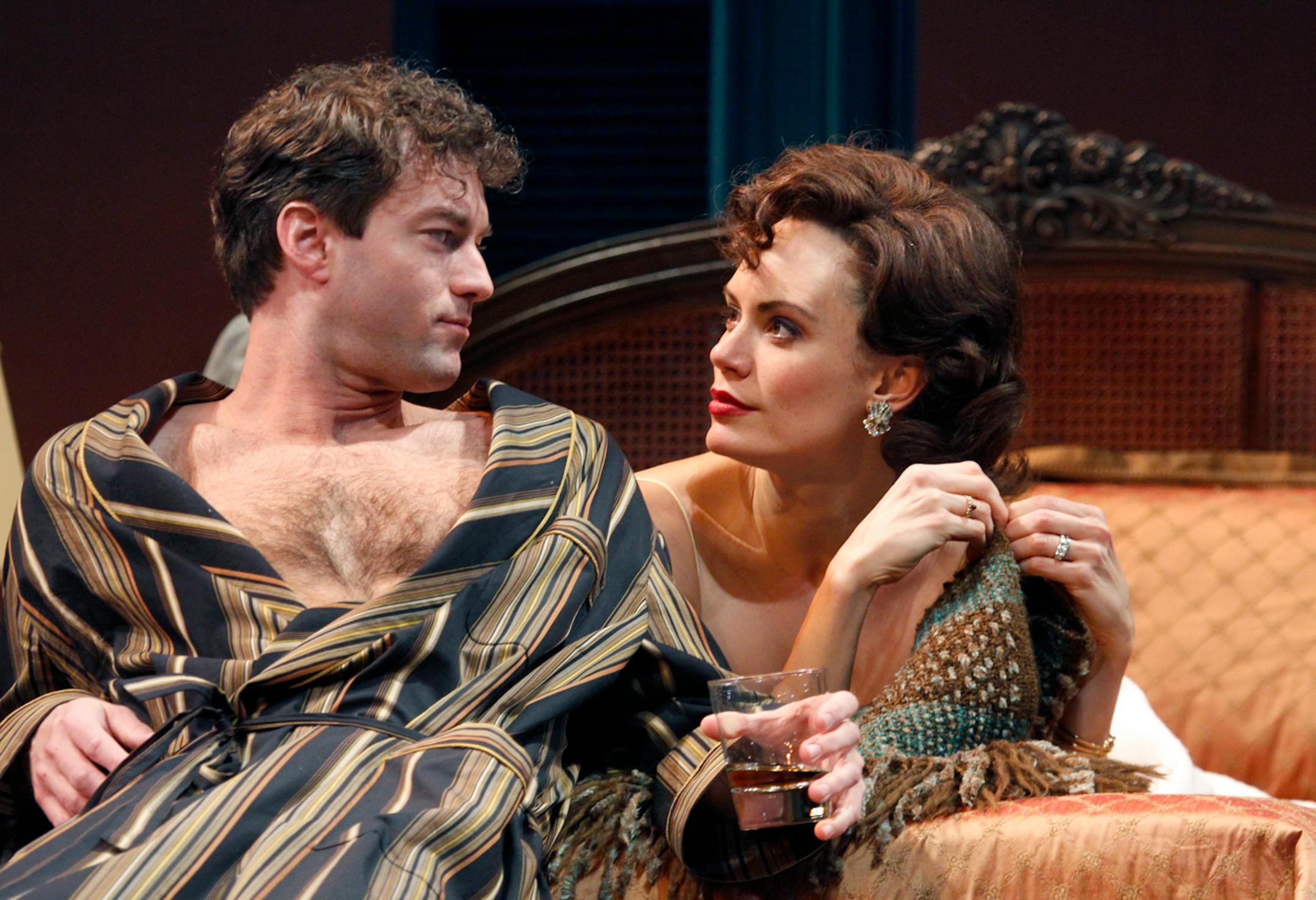 Emily Swallow (Maggie) talks with her husband Brick (Peter Christian Hansen) in Tennessee Williams' "Cat on a Hot Tin Roof."