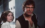 Carrie Fisher and Harrison Ford star in the original "Star Wars" movie.