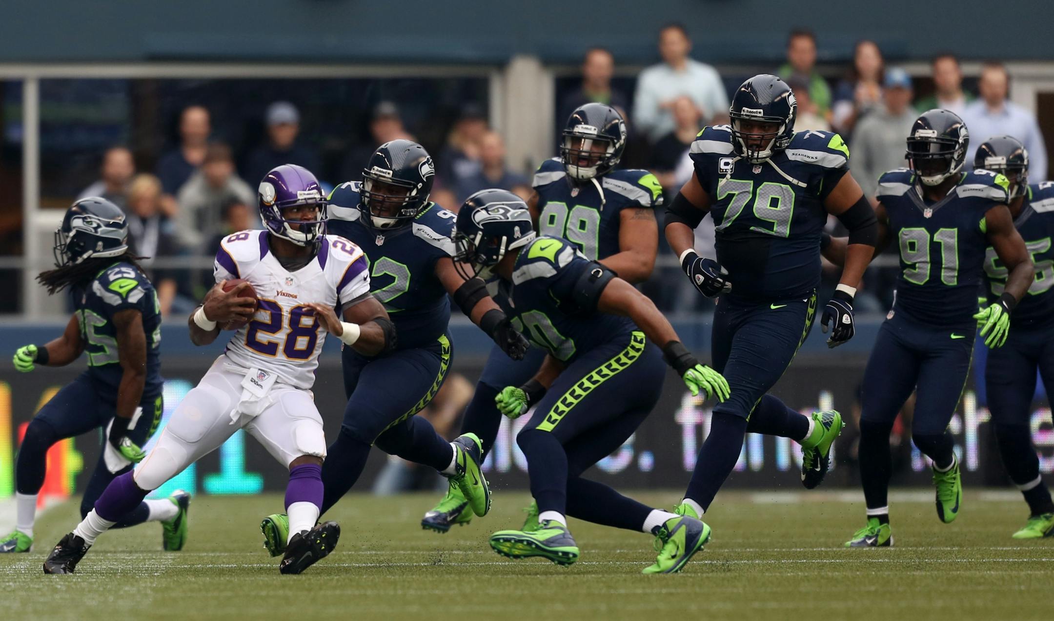 Vikings running back Adrian Peterson ran for a 74-yard gain and was tripped up by Brandon Browner on the one-yard line in the first quarter.