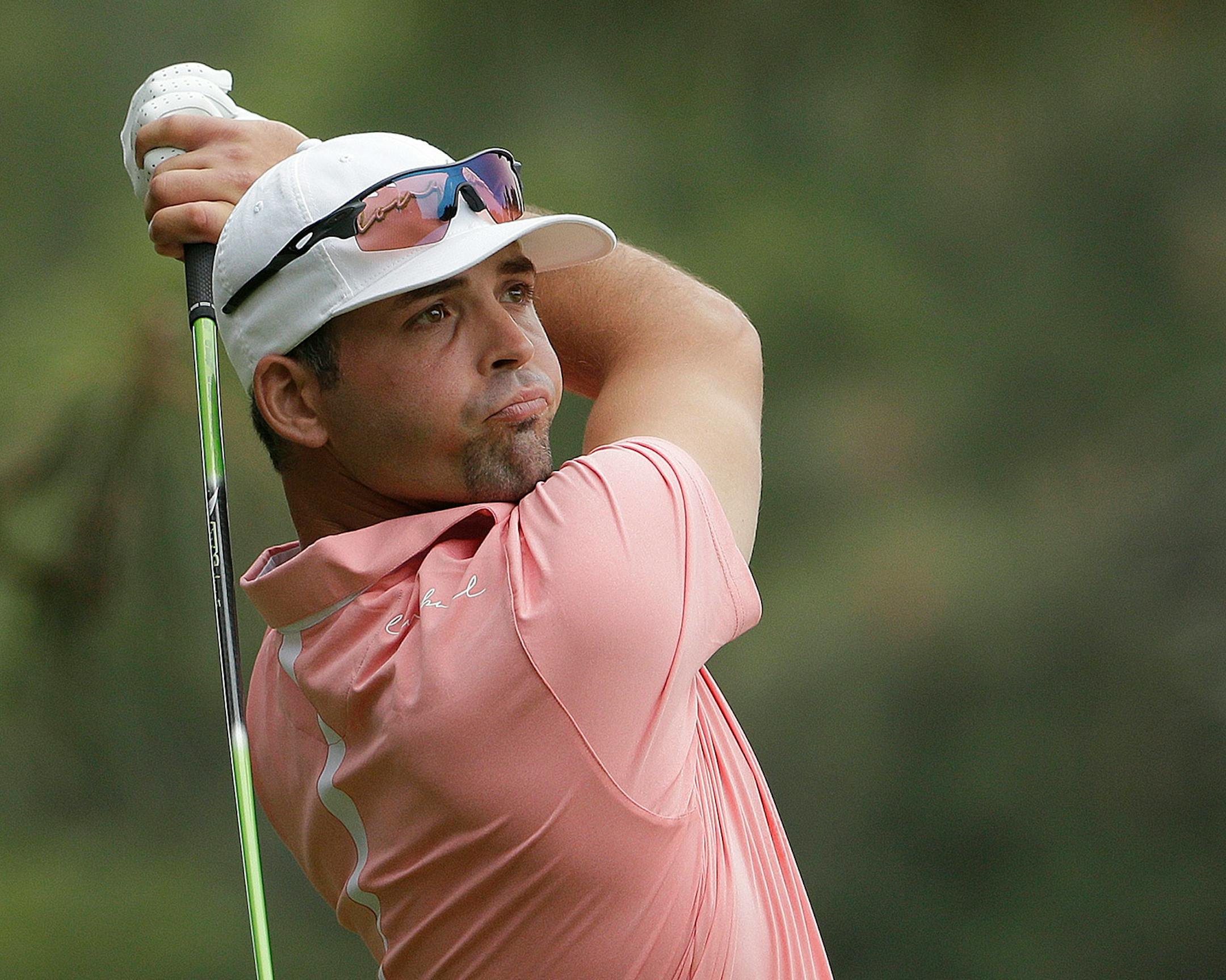 Clayton Rask watches his tee shot on the second hole during the first round of the U.S. Open golf tournament in Pinehurst, N.C., Thursday, June 12, 2014. (AP Photo/Chuck Burton)
