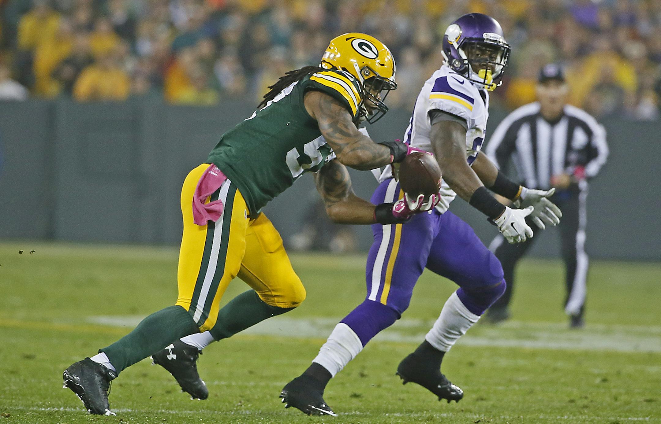 Green Bay Packers wide receiver Davante Adams (17) intercepted a ball meant for Minnesota Vikings running back Jerick McKinnon (31) in the second quarter as the Minnesota Vikings took on the Green Bay Packers at Lambeau Field, Thursday, October 2, 2014 in Green Bay, Wis. ] (ELIZABETH FLORES/STAR TRIBUNE) ELIZABETH FLORES • eflores@startribune.com