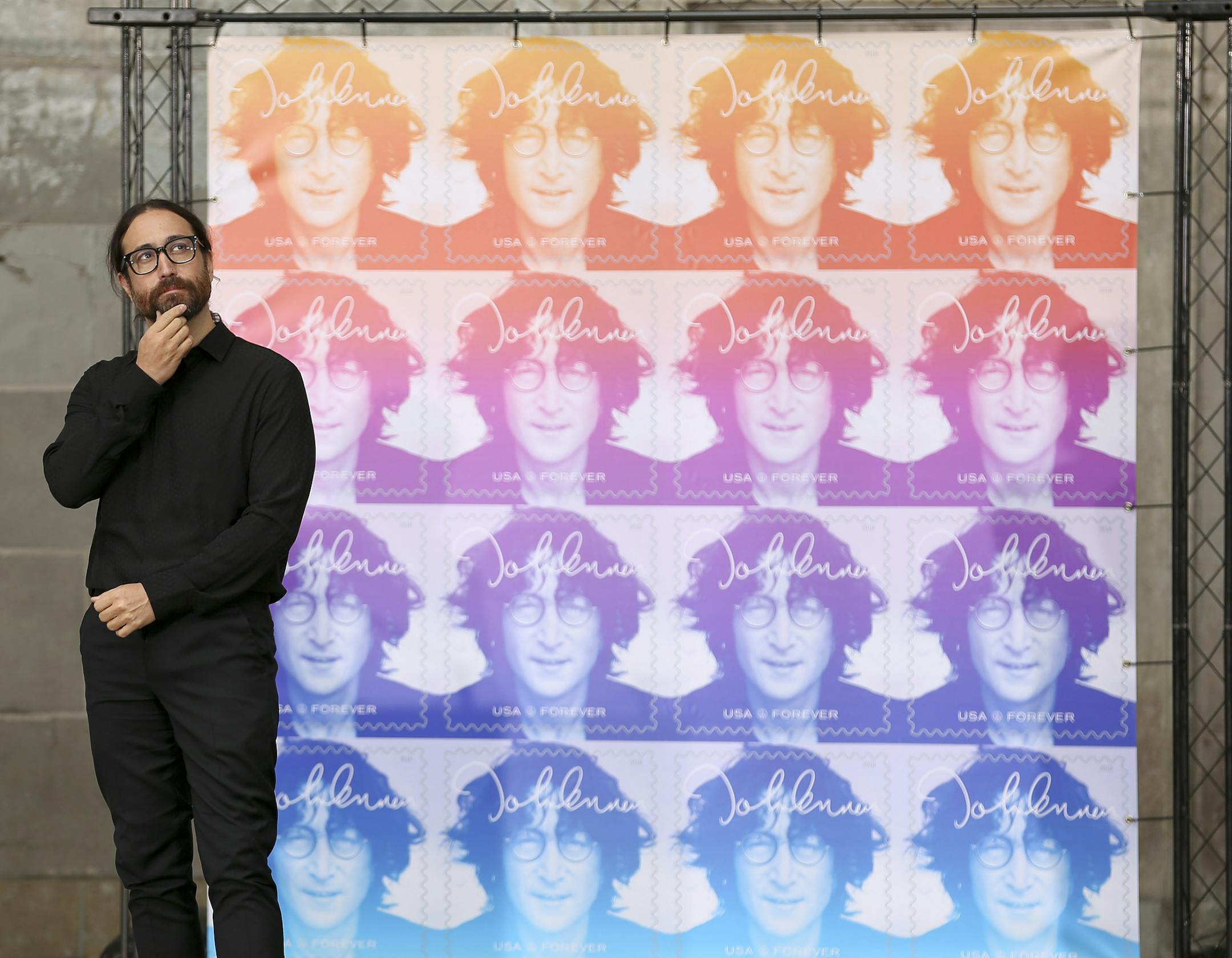 Sean Lennon, son of John Lennon, appears at a ceremony dedicating the new John Lennon Commemorative Forever Stamp, Friday, Sept. 7, 2018, in New York. (AP Photo/Stephen Groves)