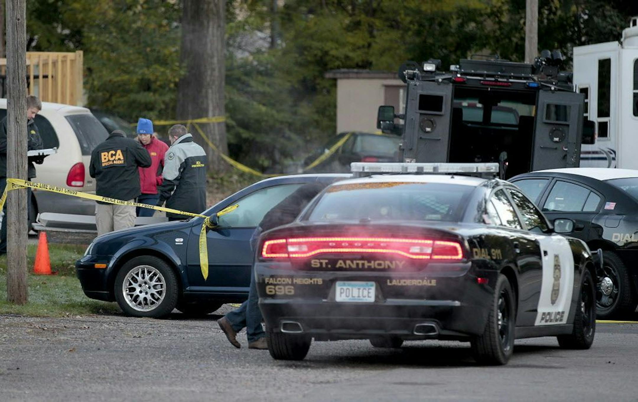 On Friday morning, members of the BCA and St. Anthony Police Department worked the scene of police-officer-involved fatal shooting that happened Thursday, Oct. 9, 2014.