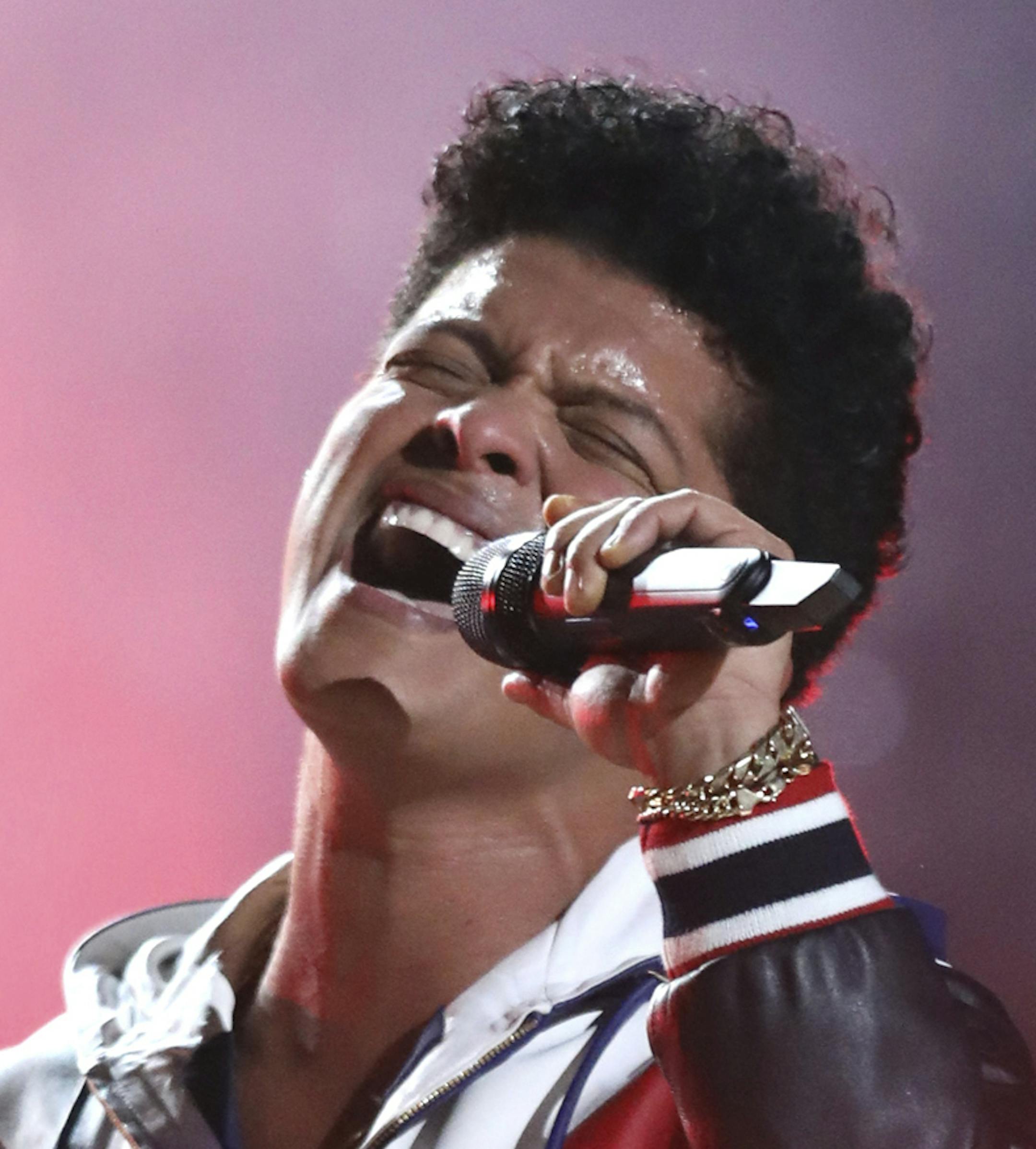 Bruno Mars performs "That's What I Like" at the 59th annual Grammy Awards on Sunday, Feb. 12, 2017, in Los Angeles. (Photo by Matt Sayles/Invision/AP)