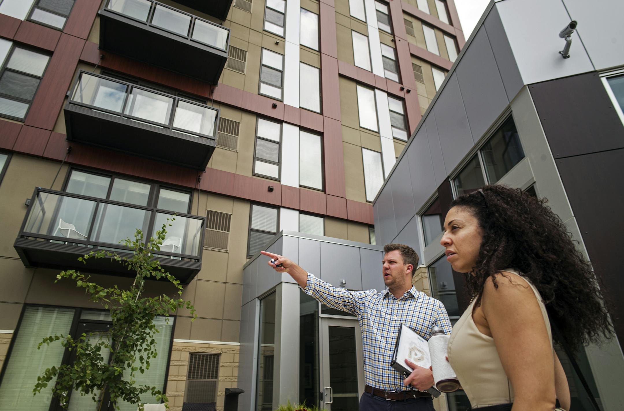 One Southdale Place in Edina, which opened in January, is among a growing number of new rentals in the Twin Cities suburbs. On Monday, leasing consultant Erin Halvorson showed recent Chicago transplant Irma Reyes a two-bedroom apartment.