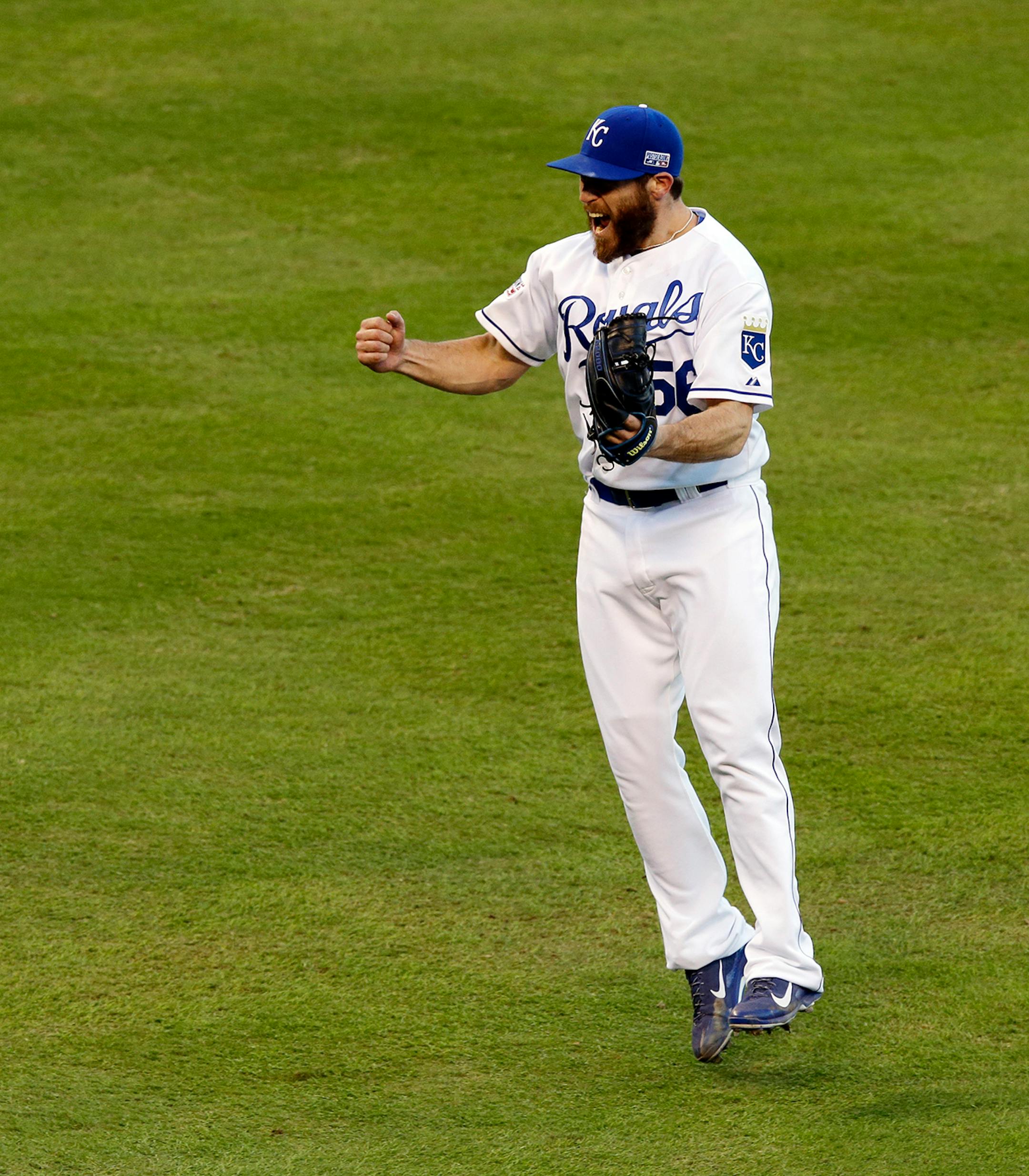Kansas City Royals relief pitcher Greg Holland celebrates after defeating against the Baltimore Orioles 2-1 in Game 4 of the American League baseball championship series Wednesday, Oct. 15, 2014, in Kansas City, Mo. The Royals advance to the World Series. (AP Photo/Chris O'Meara)