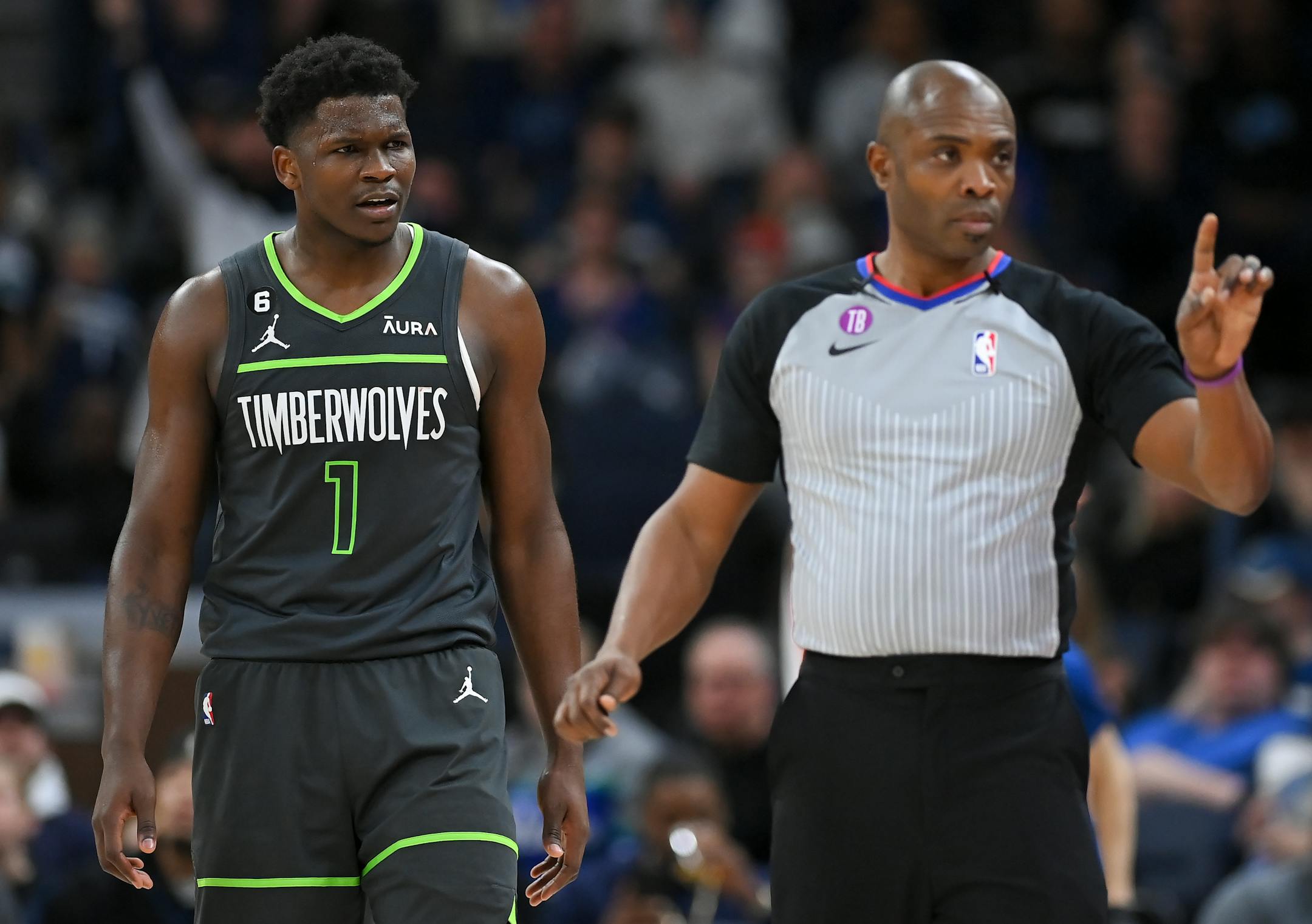 Minnesota Timberwolves guard Anthony Edwards (1) argues a foul call with an official during the second half.