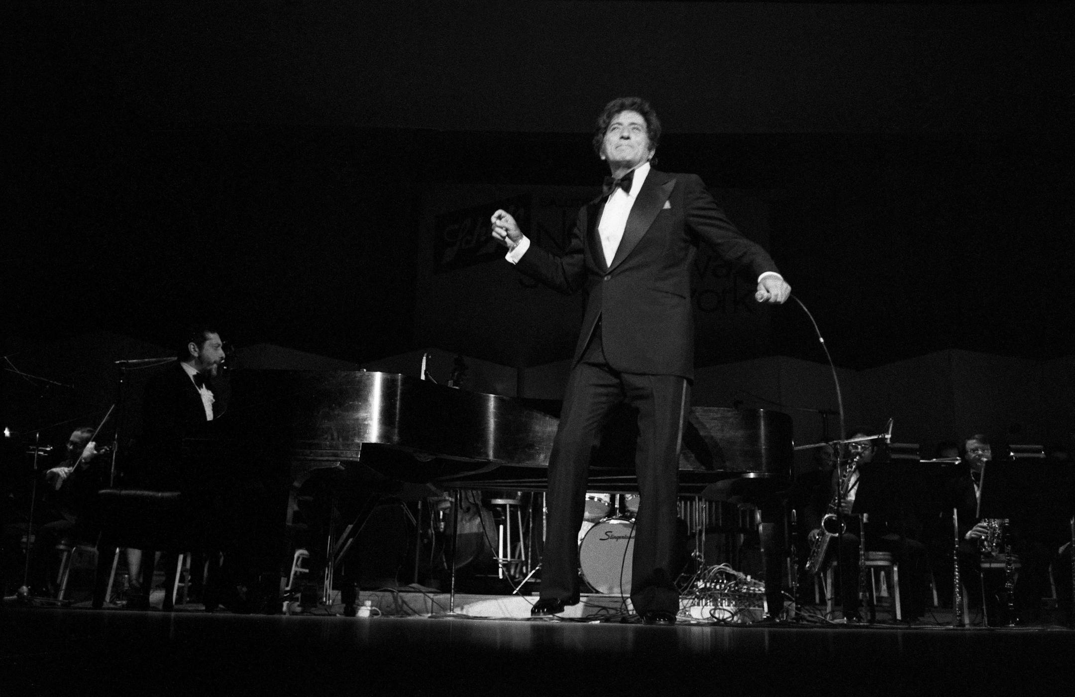 Tony Bennett performs in the Newport Jazz Festival at Carnegie Hall in New York on June 25, 1976. Bennett, a singer whose melodic clarity, jazz-influenced phrasing, audience-embracing persona and warm, deceptively simple interpretations of musical standards helped spread the American songbook around the world and won him generations of fans, died on Friday, July 21, 2023 in New York City. He was 96.