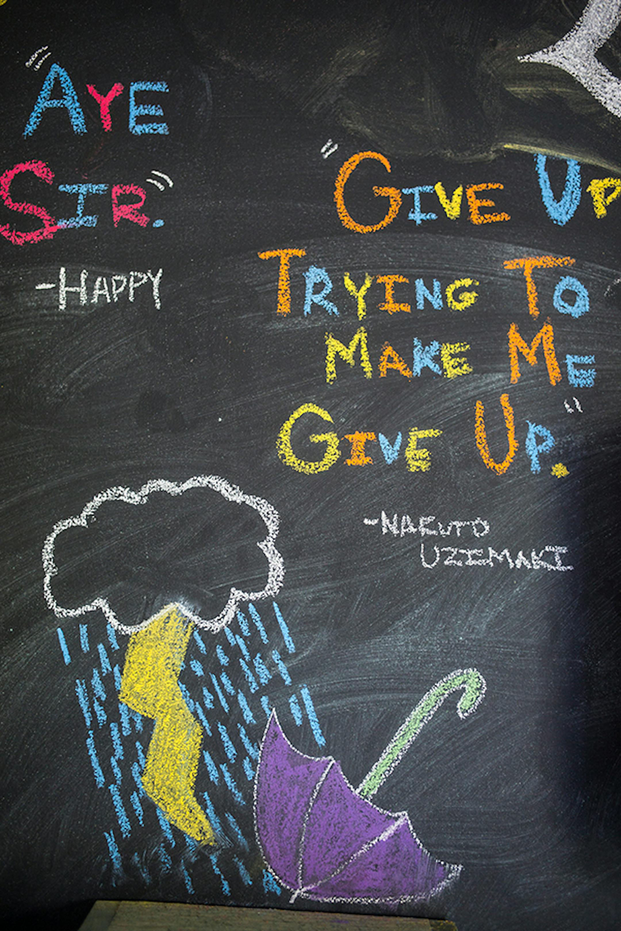 Chalkboard paint covers one large wall so Abigail can personalize it with her drawings and favorite quotations.