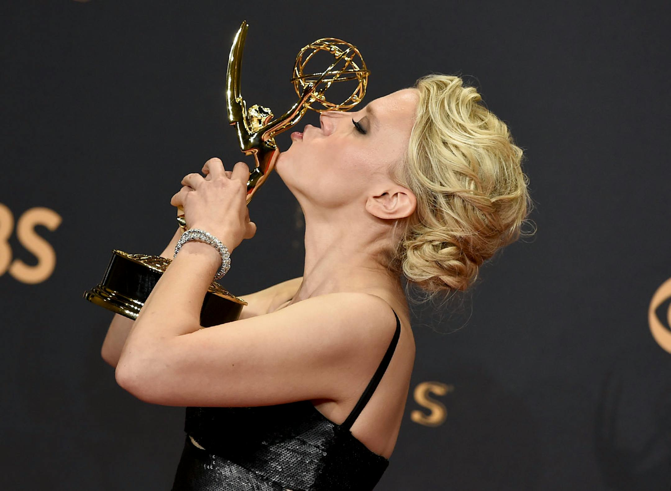Kate McKinnon poses in the press room with the award for outstanding supporting actress in a comedy series for "Saturday Night Live" at the 69th Primetime Emmy Awards on Sunday, Sept. 17, 2017, at the Microsoft Theater in Los Angeles.