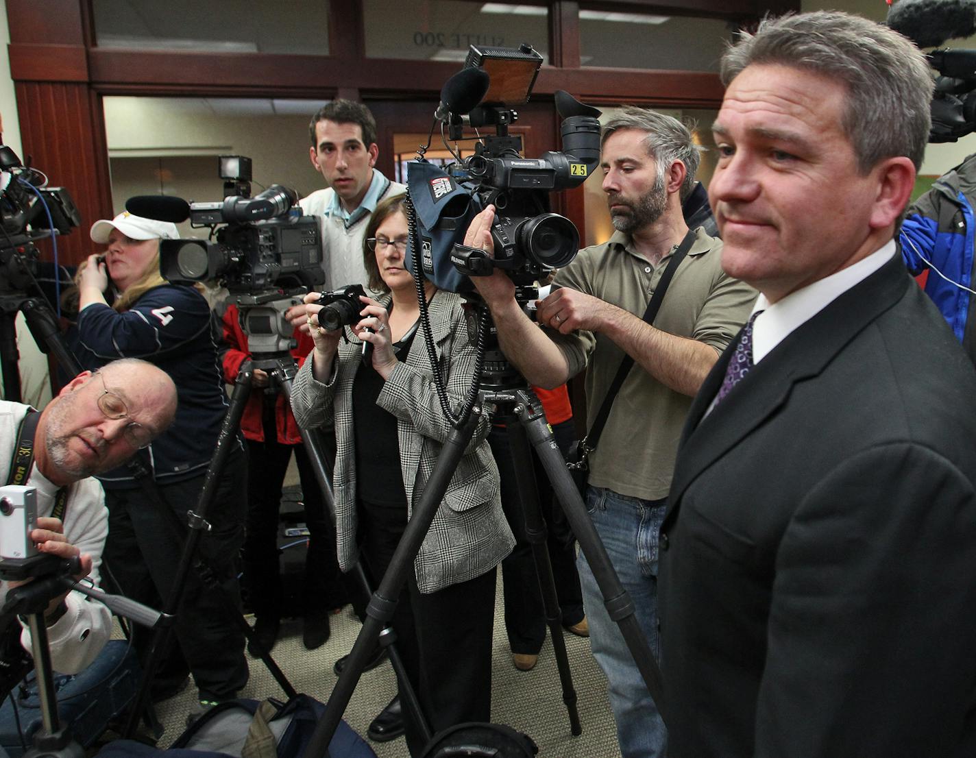 Minnesota State head football coach Todd Hoffner was cleared of child pornography charges relating to videos he made of his children. Hoffner, along with wife Melodee and lawyers held a press conference in Mankato to discuss the dropping of all charges. Todd Hoffner met with the media. (MARLIN LEVISON/STARTRIBUNE(mlevison@startribune.com (cq - ORG XMIT: MIN1211301725120179