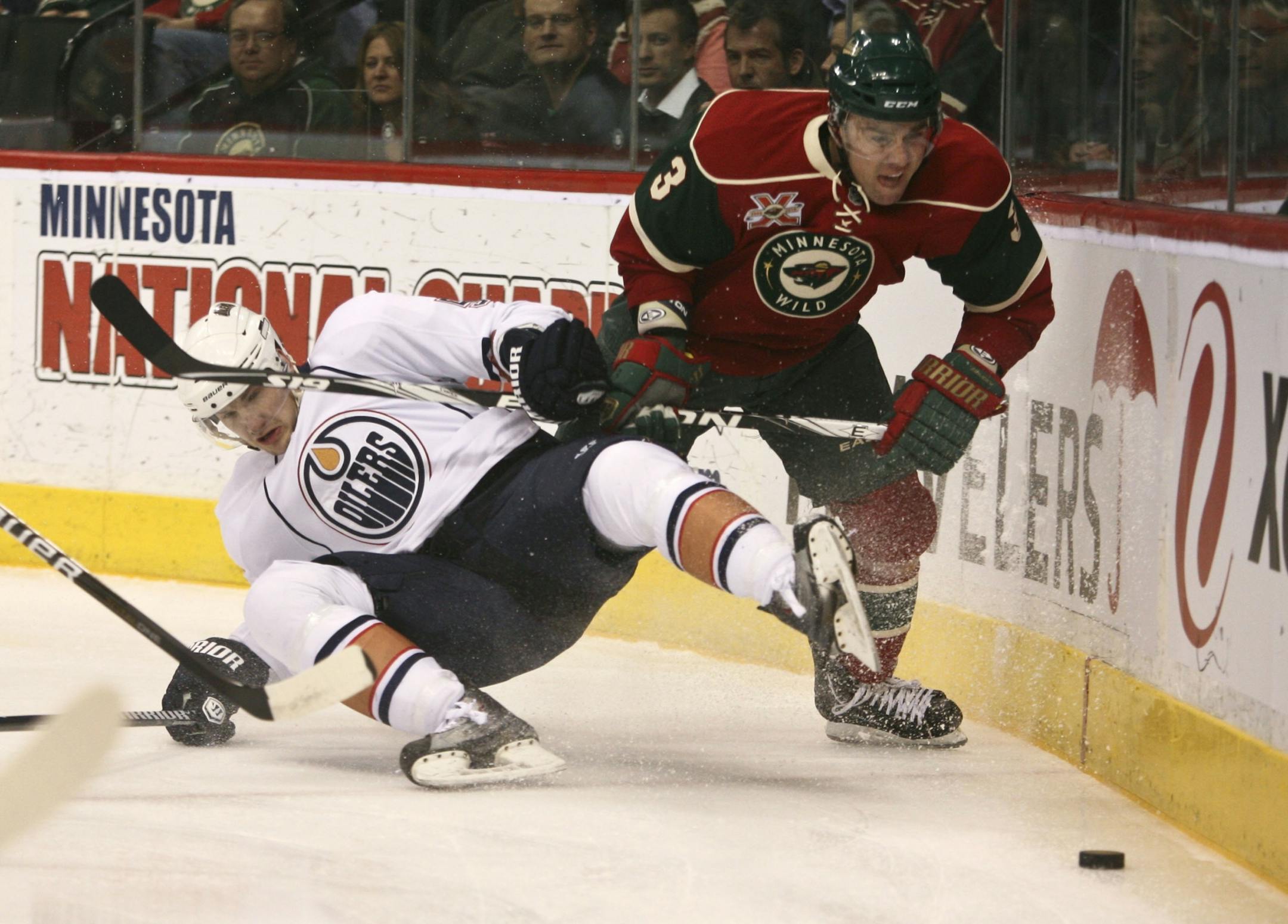 Marek Zidlicky knocked Edmonton's Ladislav Smid off the puck Tuesday as Zidlicky made his way around the back of the Oilers' net.