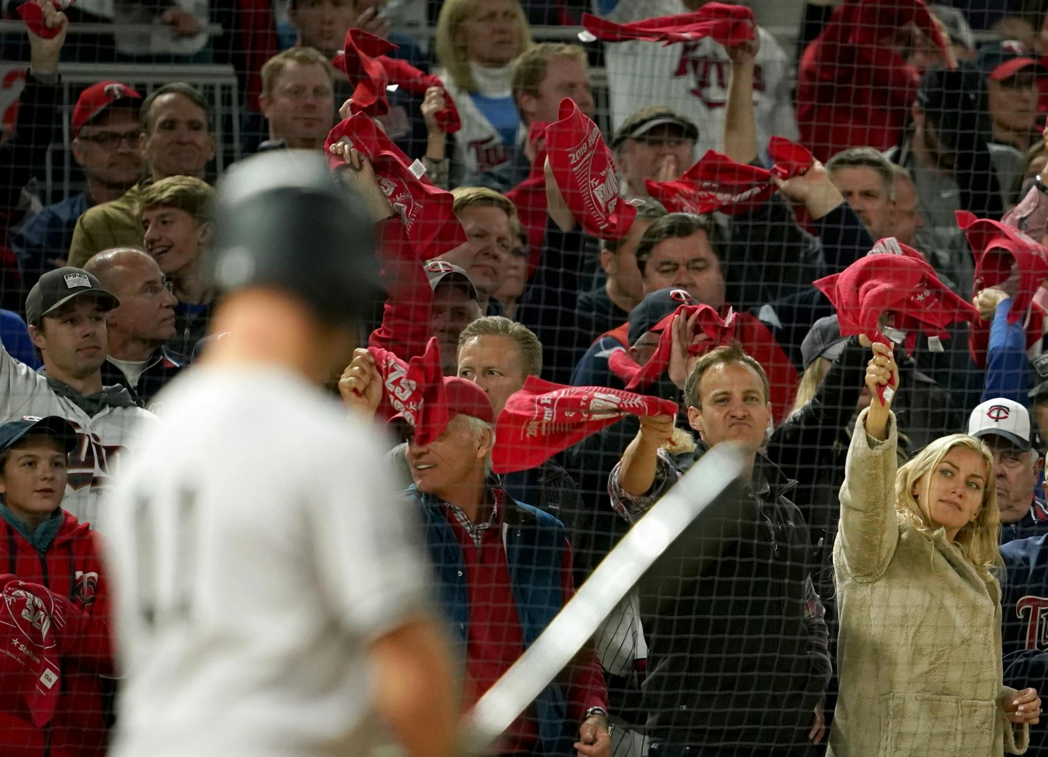 Fans waved the Homer Hankies to to get behind the Twins in the third inning.