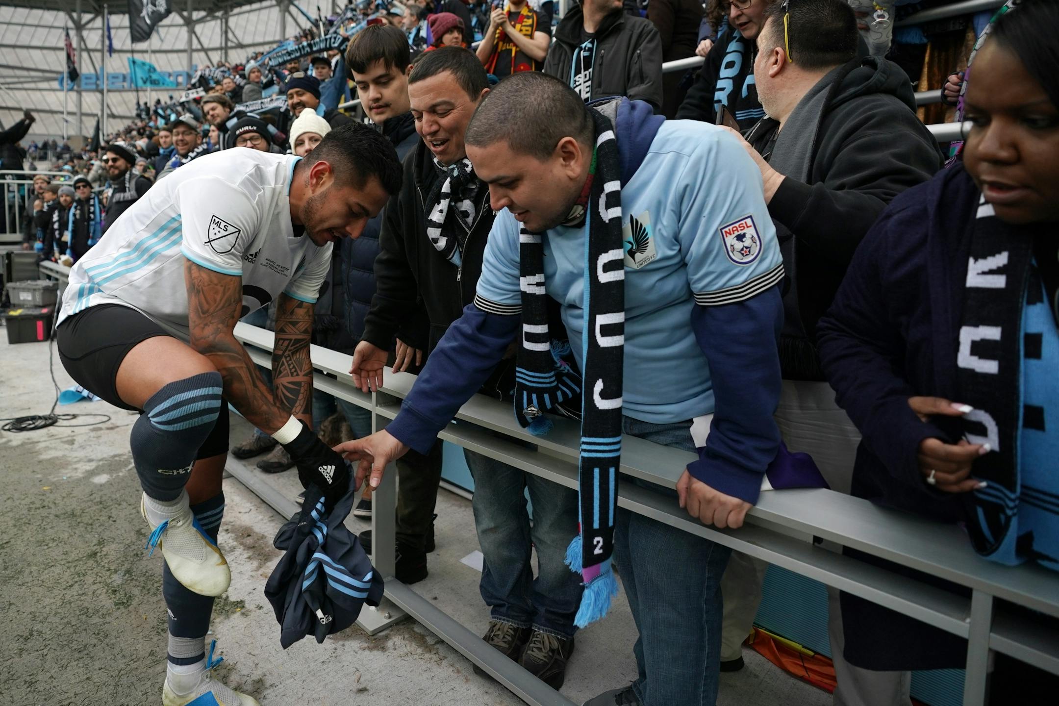 Minnesota United defender Wyatt Omsberg (22) gave his shorts to a fan in the stands after the tie at the end of the second half.