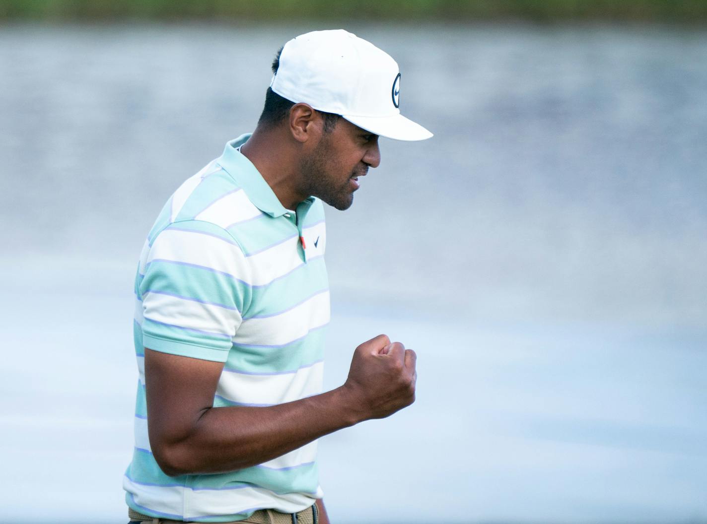 Tony Finau reacts on the 18th hole after winning the 3M Open Sunday, July 24, 2022 at the Tournament Players Club in Blaine, Minn. ]