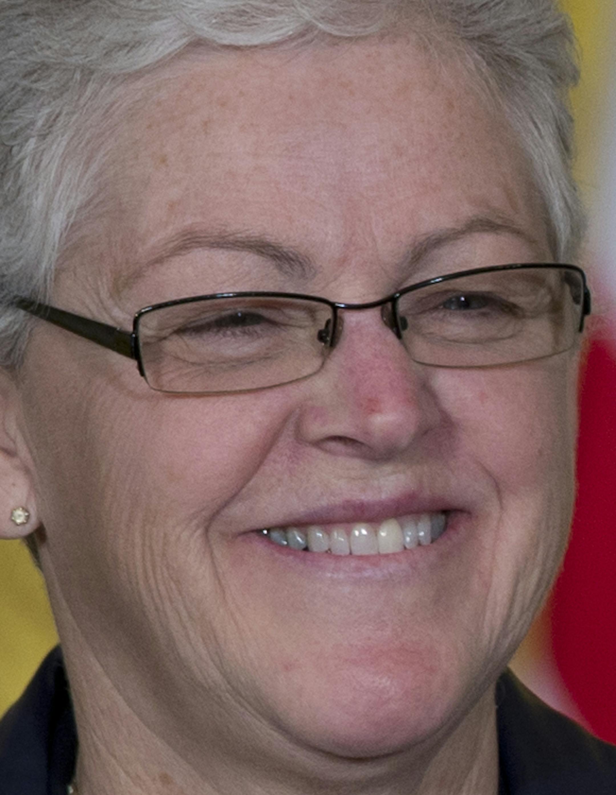 Gina McCarthy stands on stage as President Barack Obama announces her nomination to head the EPA in the East Room of the White House in Washington, Monday, March 4, 2013. (AP Photo/Carolyn Kaster)