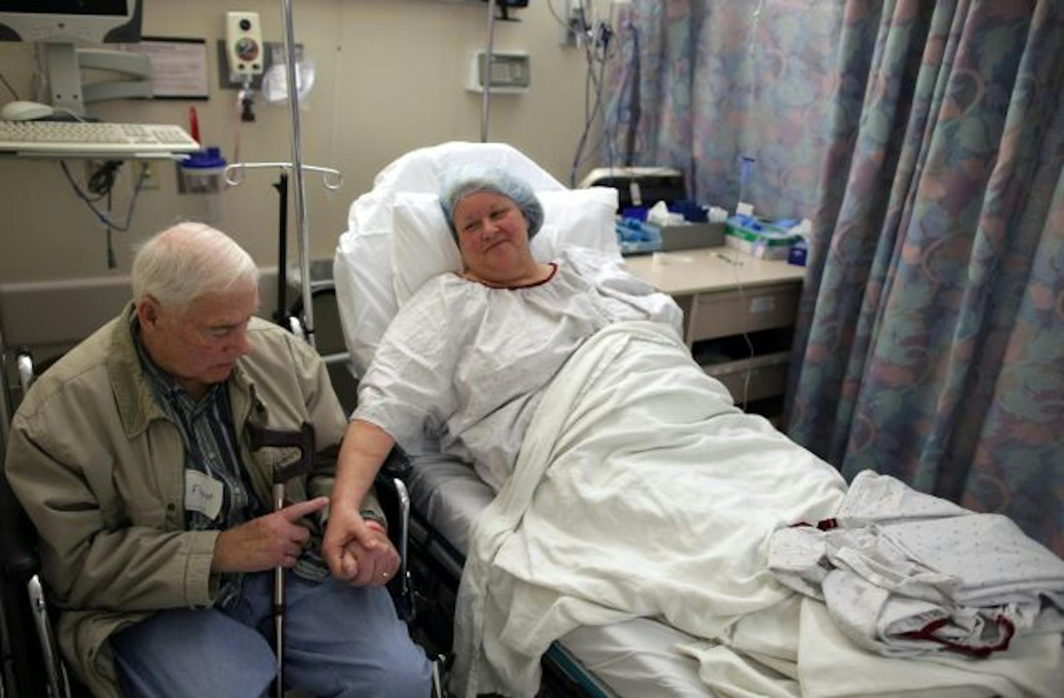 Floyd Johnson waited with his wife, Kathie Blomstrand, of Duluth, before her surgery Thursday at HCMC to donate her kidney. The kidney was sent to Maryland as part of a paired donor program. A kidney from Maryland was donated to Johnson.