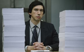 This image released by Amazon Studios shows Adam Driver in a scene from "The Report." (Atsushi Nishijima/Amazon Studios via AP)