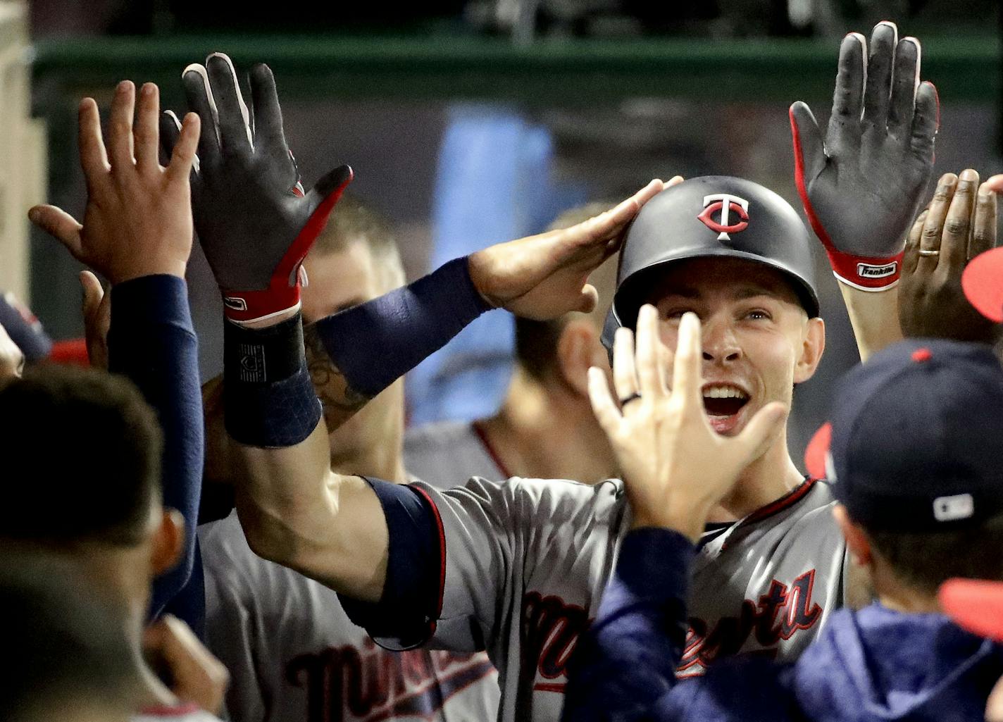 Minnesota Twins' Max Kepler celebrates in the dugout after his home run against the Los Angeles Angels during the sixth inning of a baseball game in Anaheim, Calif., Thursday, May 10, 2018. (AP Photo/Chris Carlson)