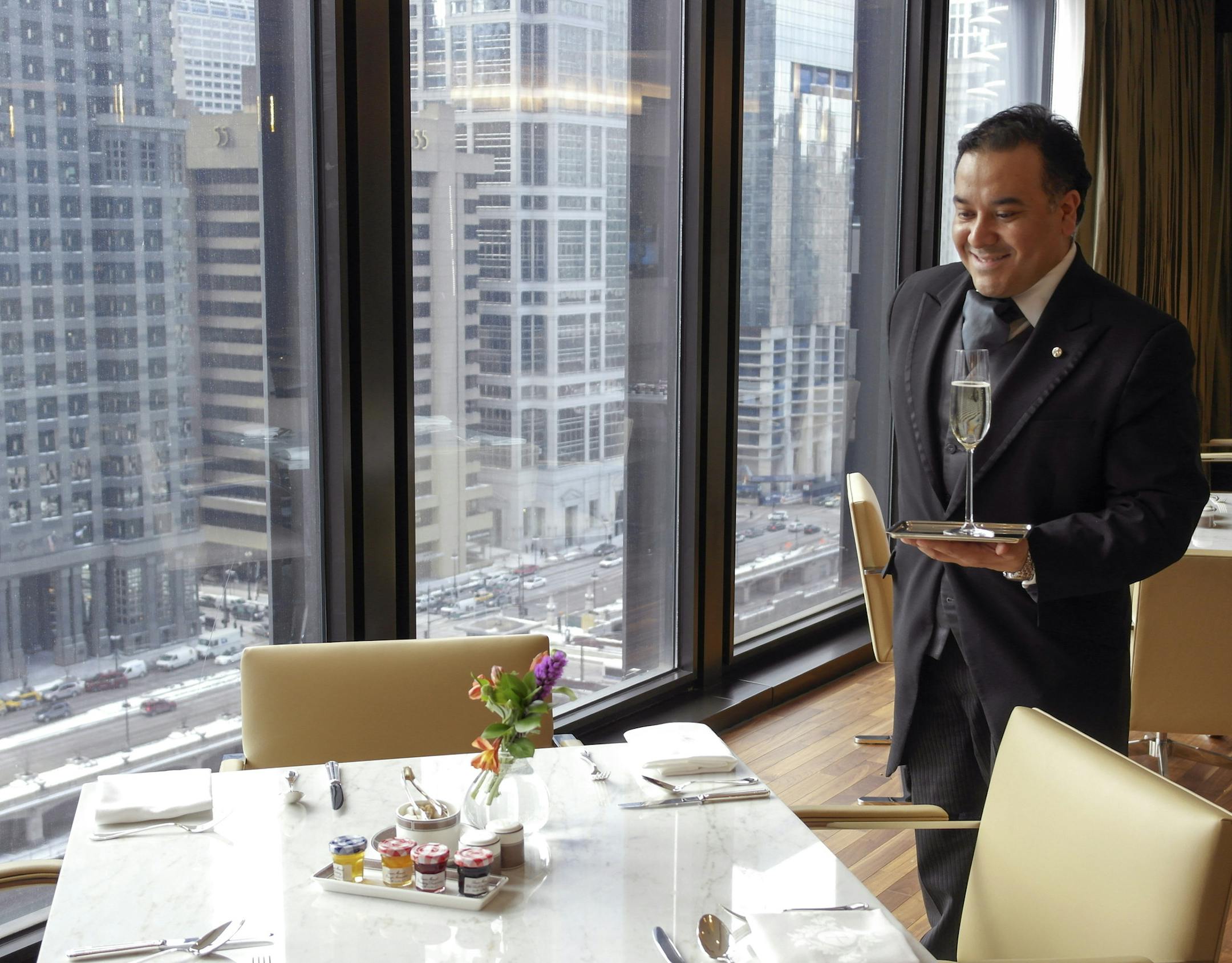 In an undated handout photo, Carlos Carrera, director of butler services for The Langham Chicago. Butler service costs $75 a day at the hotel, which has a rotating staff of eight dedicated butlers specializing in services like unpacking, pressing shirts and arranging daily details like dinner reservations or child care. (Eric Ziegenhagen via The New York Times) -- PHOTO MOVED IN ADVANCE AND NOT FOR USE - ONLINE OR IN PRINT - BEFORE MARCH 02, 2014. -- NO SALES; FOR EDITORIAL USE ONLY WITH STORY S