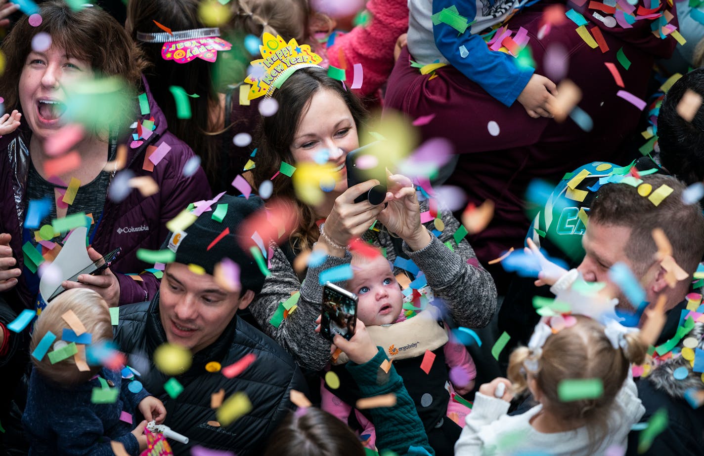 The confetti dropped during the Noon Year's Confetti Dance Party. ] LEILA NAVIDI • leila.navidi@startribune.com