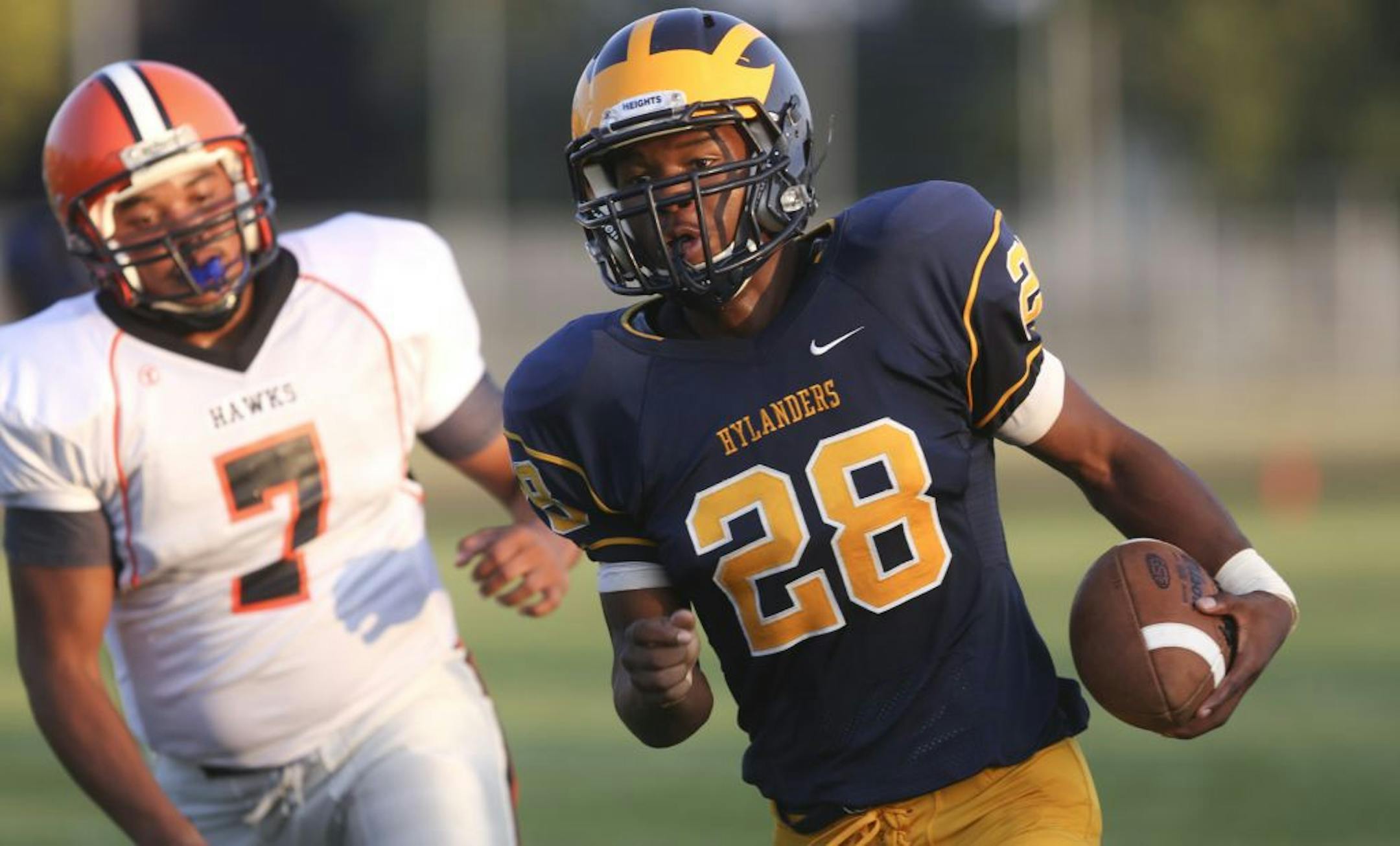 Columbia Heights running back D'Aireus Mock ran in for a touchdown during the first quarter against St. Paul Humboldt.