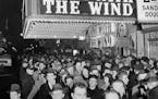 FILE - In this Dec. 19, 1939 file photo, a crowd gathers outside the Astor Theater on Broadway during the premiere of "Gone With the Wind" in New York
