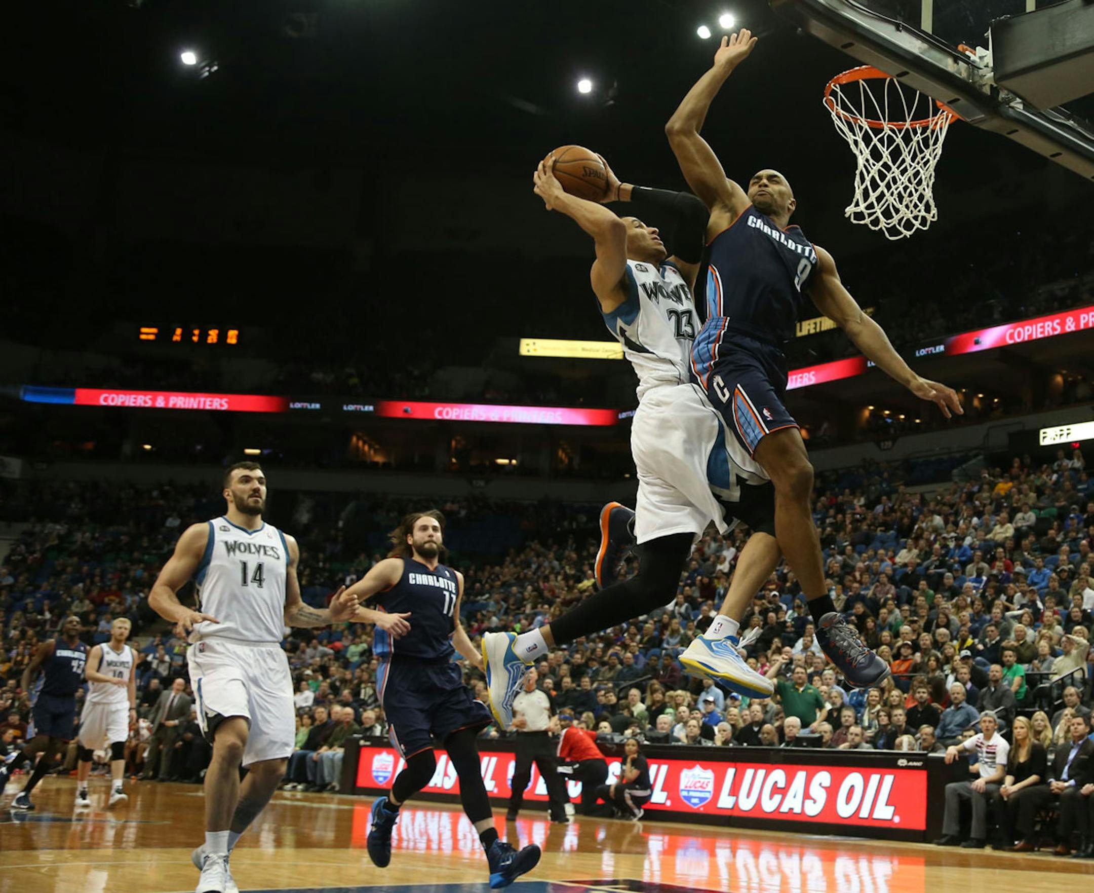 The Wolves' Kevin Martin attempted a layup with Charlotte's Gerald Henderson defending.