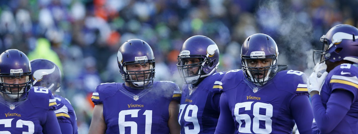 Minnesota Vikings offensive lineman Brandon Fusco (63), Joe Berger (61), Mike Harris (79) and T.J. Clemmings (68).