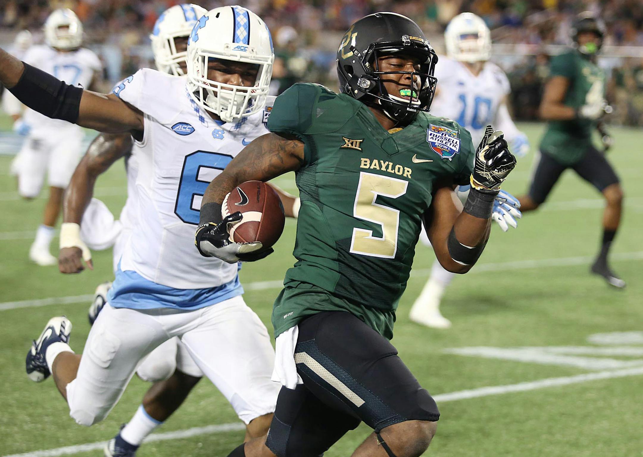 Baylor running back Johnny Jefferson (5) runs an 80-yard touchdown during the Russell Athletic Bowl on Tuesday, Dec. 29, 2015, at the Orlando Citrus Bowl in Orlando, Fla. (Stephen M. Dowell/Orlando Sentinel/TNS)