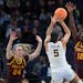 Minnesota Golden Gophers guard Ajok Madol (12) is called for a foul against Michigan Wolverines guard Laila Phelia (5) in the third quarter of an NCAA