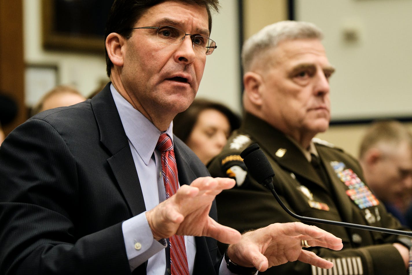 FILE — Secretary of Defense Mark Esper, alongside Gen. Mark Milley, the chairman of the Joint Chiefs of Staff, testifies before the House Armed Services Committee in 2019. Esper and Milley both disagreed with the President's wish to call in active-duty Army to Minneapolis in 2020.