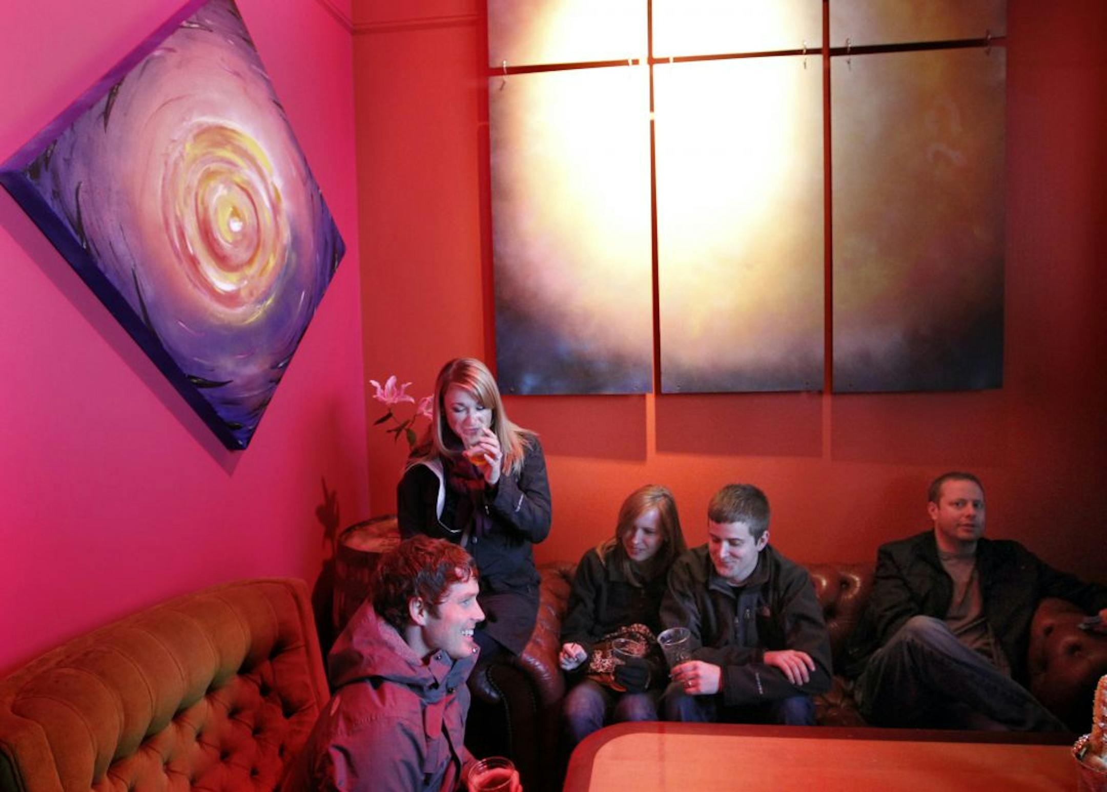 After a year of legislative hoopla, Minneapolis' first brewery taprooms are finally opening. Harriet's taproom, is like a bar in your garage with living room furniture and big enough to have a band.It's on the backside of Harriet's brewing room. From left Chris Hunt, Sarah Hunt, Heather Leng and Kyle Leng and Ben Dover in one of the corner seating areas in Harriet's Tap room. [ TOM WALLACE • twallace@startribune.com _ Assignments #20023022A_ April 21, 2012_ SLUG: night0427_ EXTRA INFORMATION: CQ