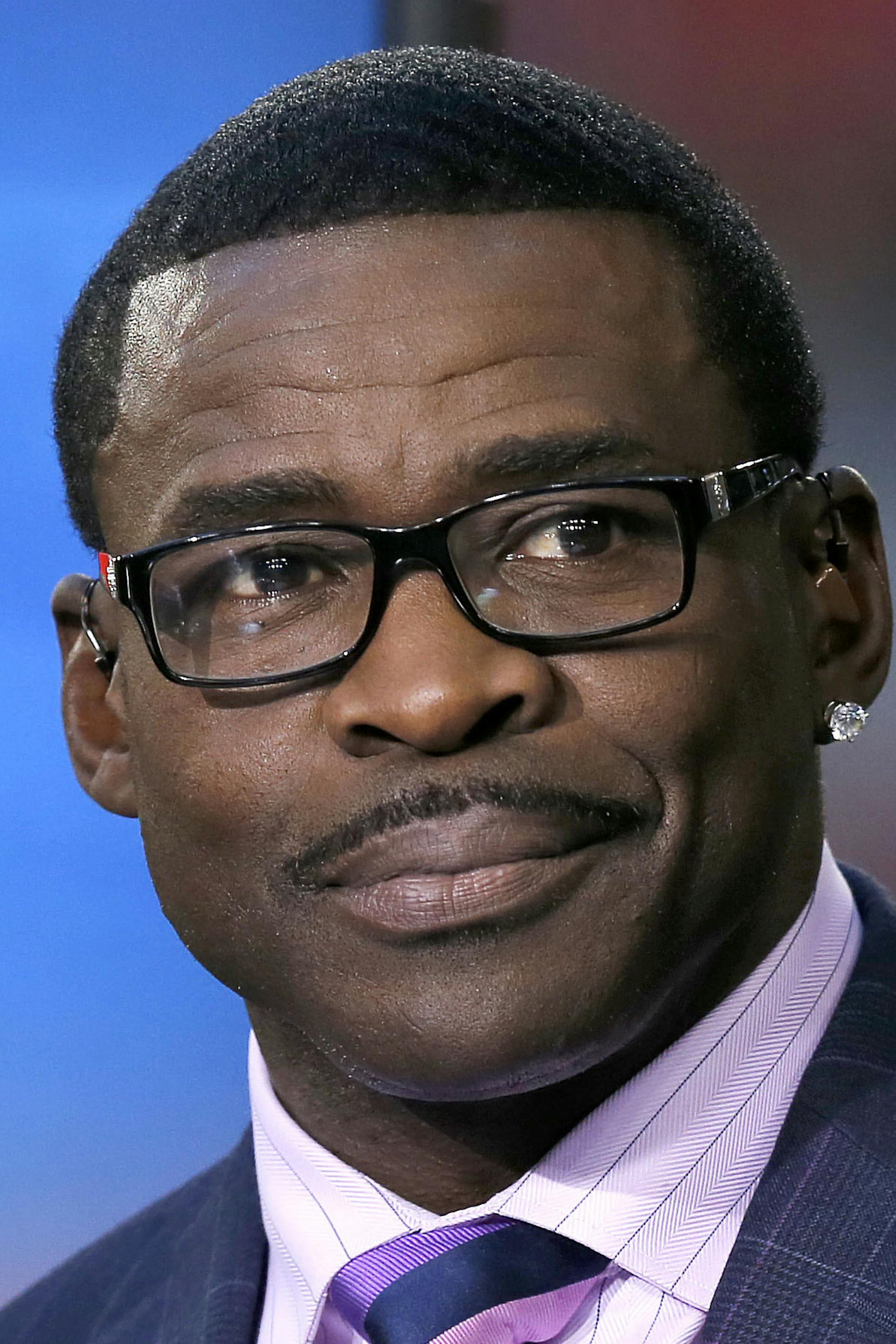 NFL Network Thursday Night Football live analyst Michael Irvin speaks during a NFL football game against the Arizona Cardinals and the Seattle Seahawks, Thursday, Oct. 17, 2013, in Glendale, Ariz. (AP Photo/Ross D. Franklin) ORG XMIT: NYOTK