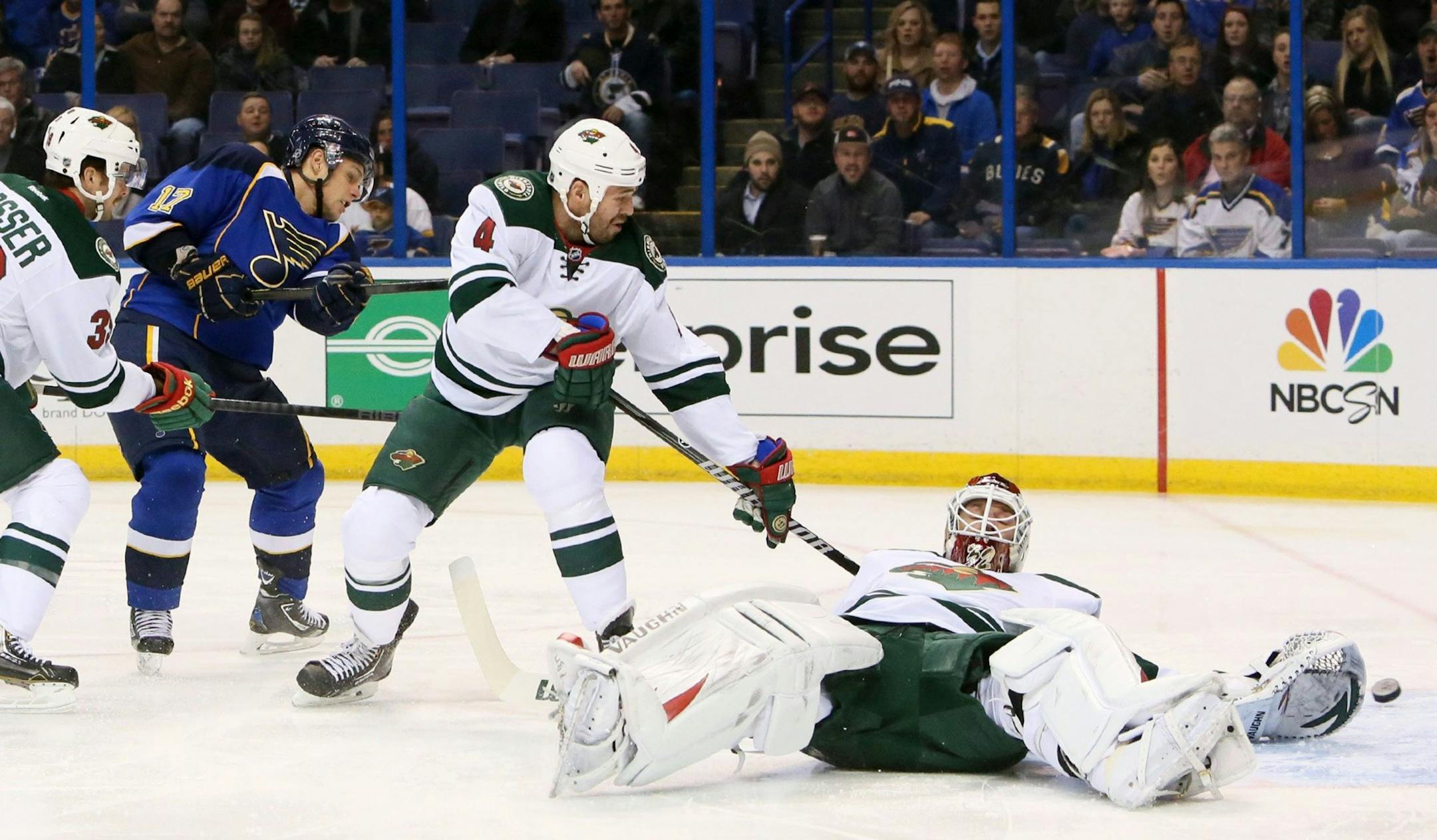 St. Louis Blues left wing Vladimir Sobotka, left, scores past Minnesota Wild goaltender Niklas Backstrom, right, during first-period action on Monday, Nov. 25, 2013, at the Scottrade Center in St. Louis.