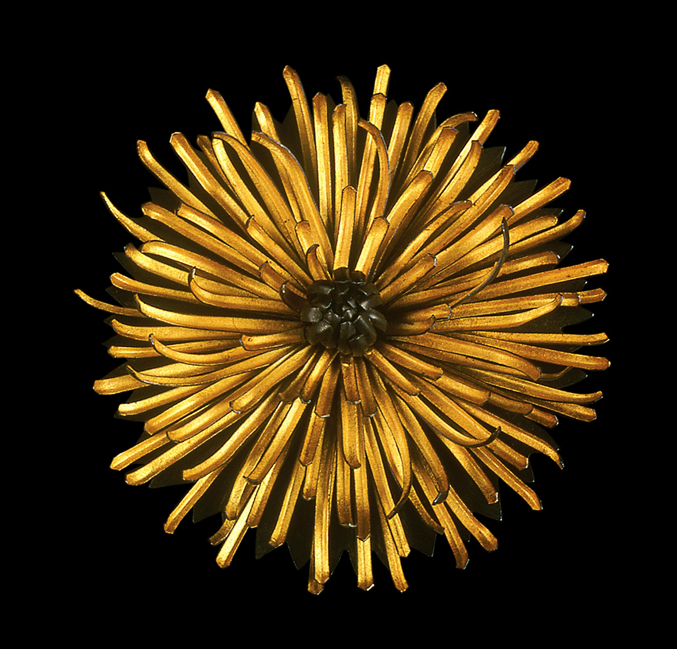 24 karat gold and sterling silver statement brooch by Judith Kinghorn. Provided by American Craft Council