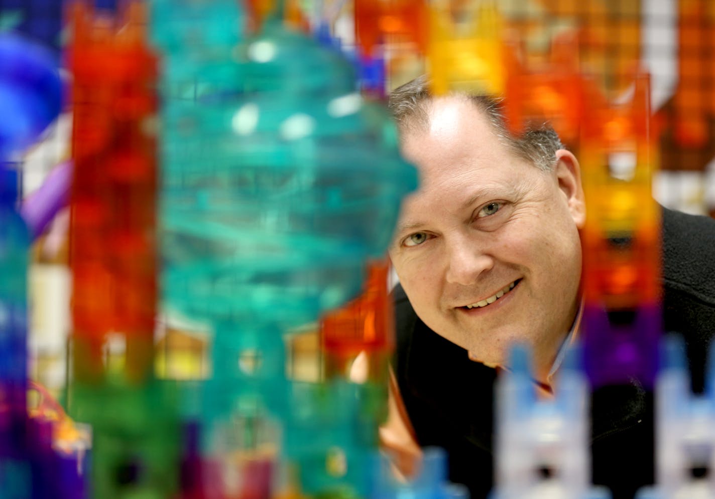 Mindware vice president Jonathan Staruck with one to their products Q BA-Maze. ] (KYNDELL HARKNESS/STAR TRIBUNE) kyndell.harkness@startribune.com Mindware VP Jonathan Staruck. Roseville-based toy company Mindware is one of the few toy companies remaining in Minnesota. Friday, December 22, 2017.