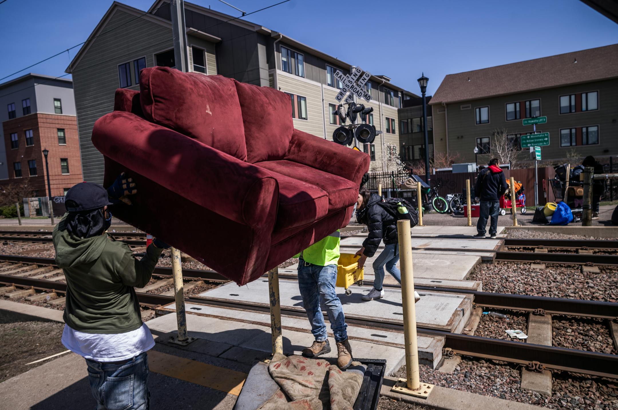 The city of Minneapolis clears out an encampment near East 24th and the Hiawatha Lightrail Trail in Minneapolis,