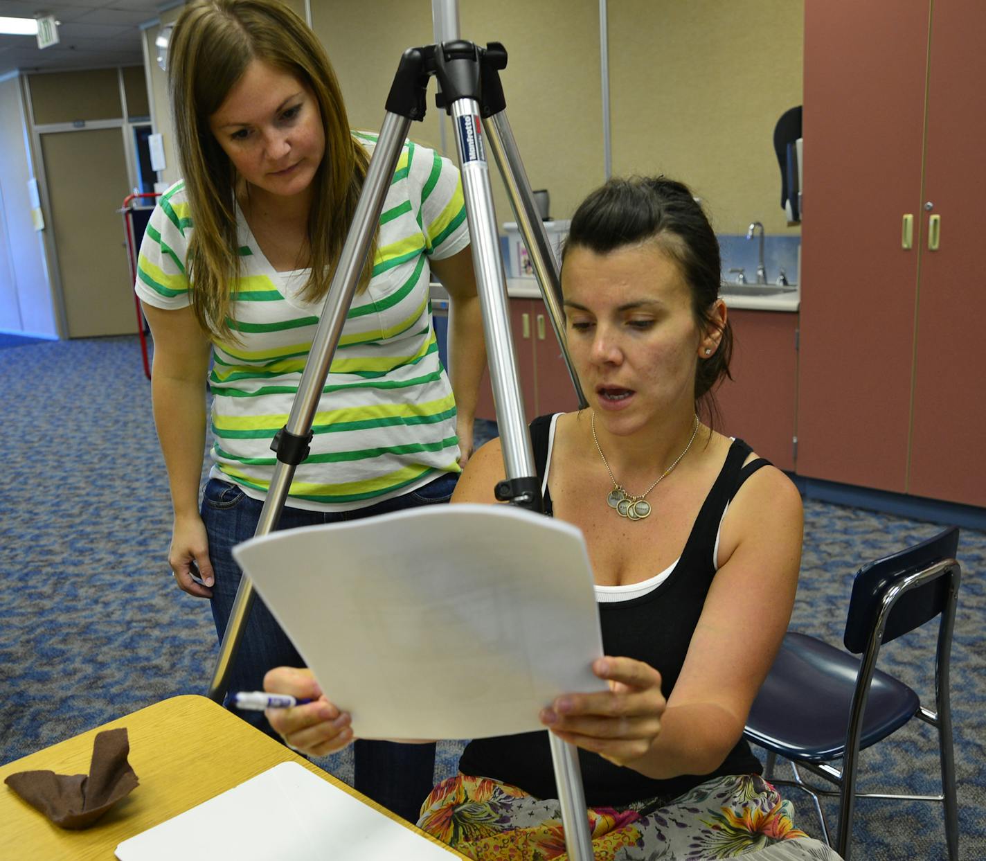 Megan Zachman, on the left is a second-grade teacher at Middleton Elementary School in Woodbury, launched a website and now is teaming with colleagues to film short videos that serve as summer refresher courses. She worked with Erin Wolfe who also teaches 2nd grade on on a graphic featuring alliteration.] Richard.Sennott@startribune.com Richard Sennott/Star Tribune Woodbury Minnesota Tuesday 7/23/13) ** (cq)