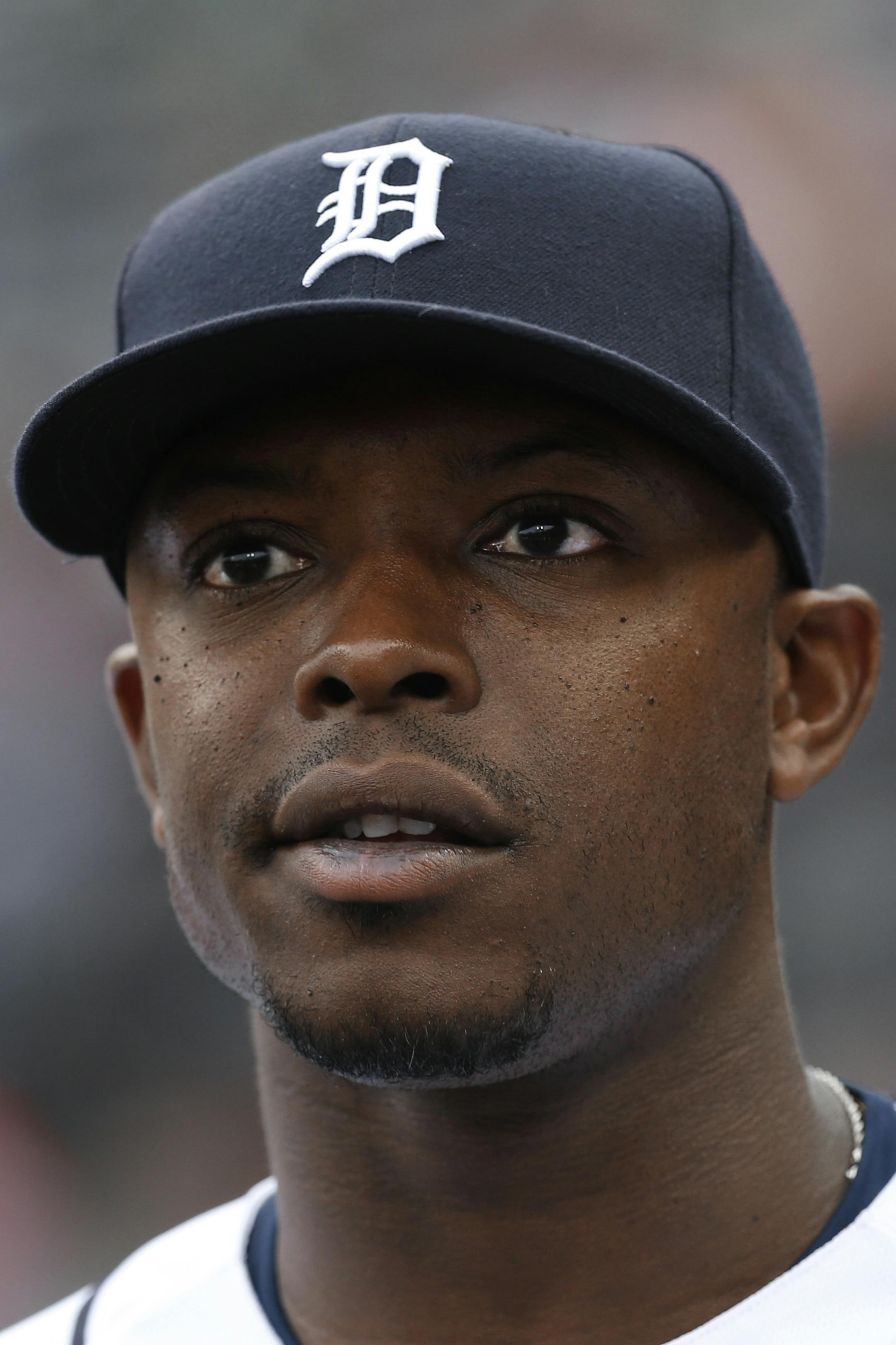 Detroit Tigers' Justin Upton watches from the dugout against the Cleveland Indians in the first inning of a baseball game, Friday, April 22, 2016, in Detroit. (AP Photo/Paul Sancya)