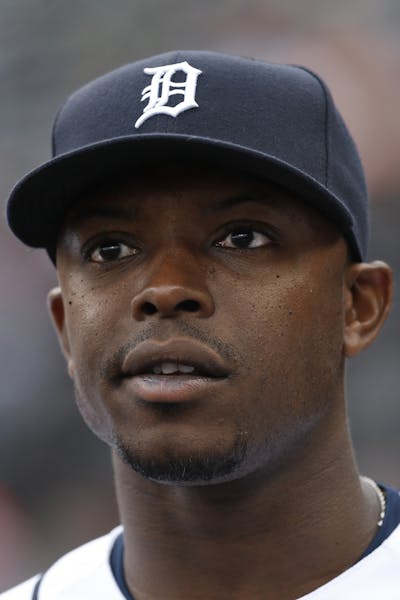 Detroit Tigers' Justin Upton watches from the dugout against the Cleveland Indians in the first inning of a baseball game, Friday, April 22, 2016, in 