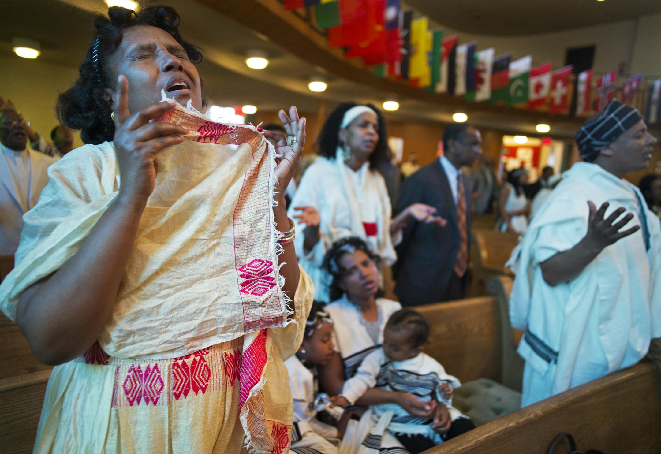 Hiymanot Gudina, moved in prayer, has been attending the Oromo service at St. Paul’s Evangelical Lutheran Church for the past four years, since she came to this country.