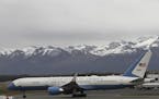 A U.S. government plane with Secretary of State Mike Pompeo aboard taxis to the runway to leave Ted Stevens Anchorage International Airport, Wednesday