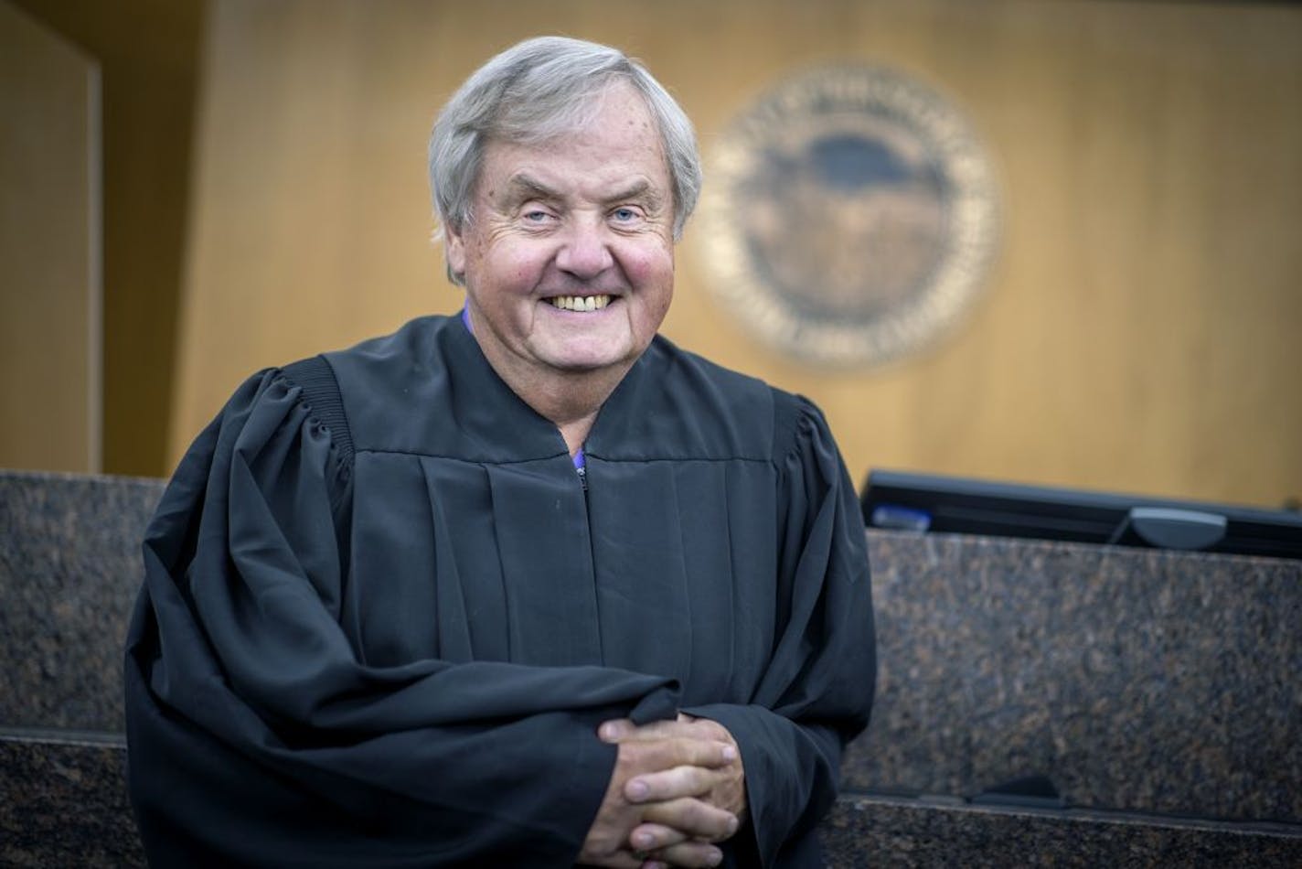 Hennepin County District Court Judge Kevin Burke is the state's longest serving judge. Appointed by the late Gov. Rudy Perpich, his time in office is up at the end of September because he turned 70. Here, Judge Burke was all smiles at his bench at the Hennepin County Government Center, Tuesday, September 29, 2020 in Minneapolis, MN.