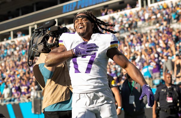 Vikings receiver K.J. Osborn celebrated after catching the game-winning a 27-yard touchdown reception in overtime.
