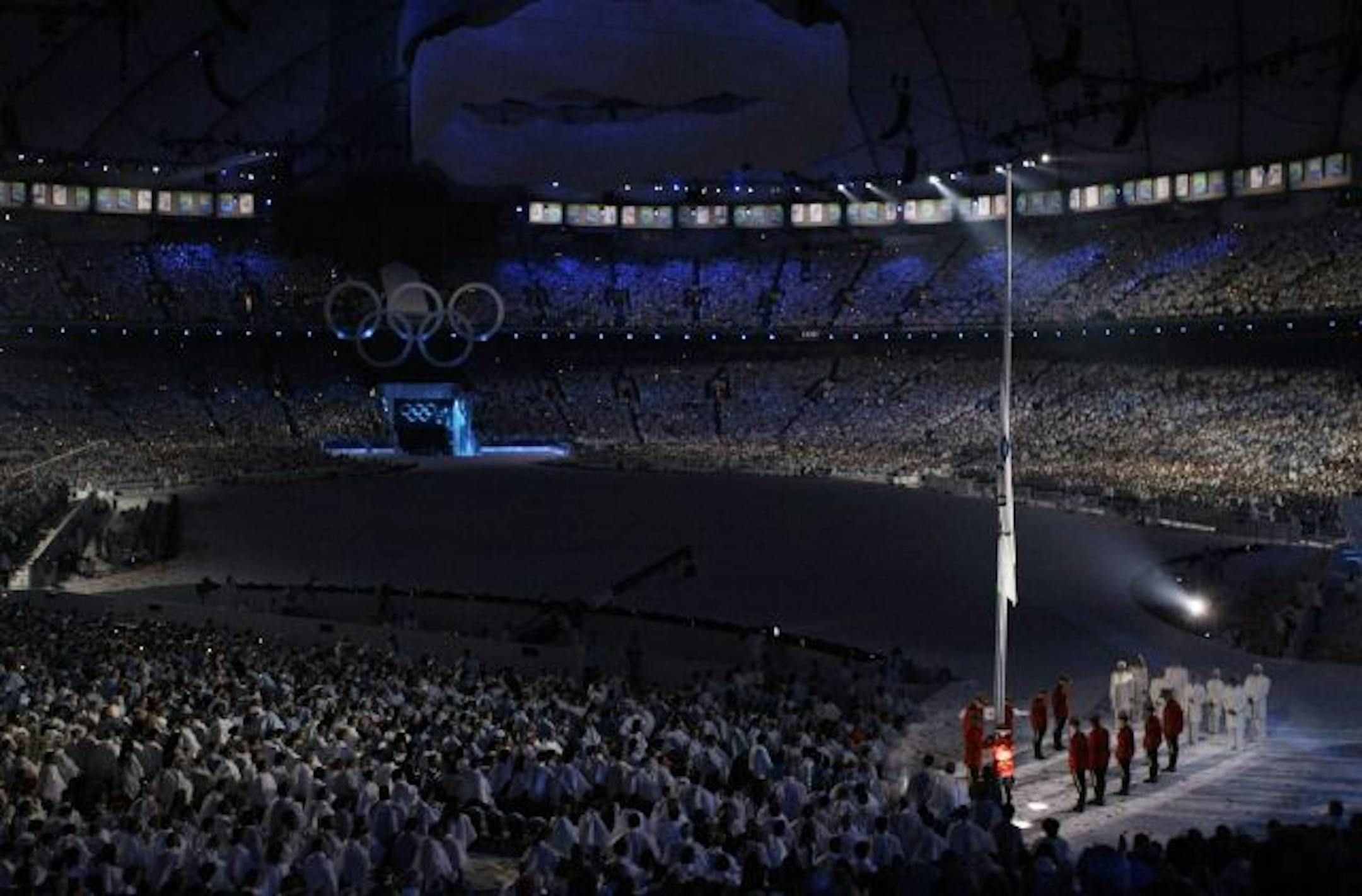 The Olympic flag was raised to half staff during a moment of silence in memory of Nodar Kumaritashvili of Georgia, who died Friday during luge training.