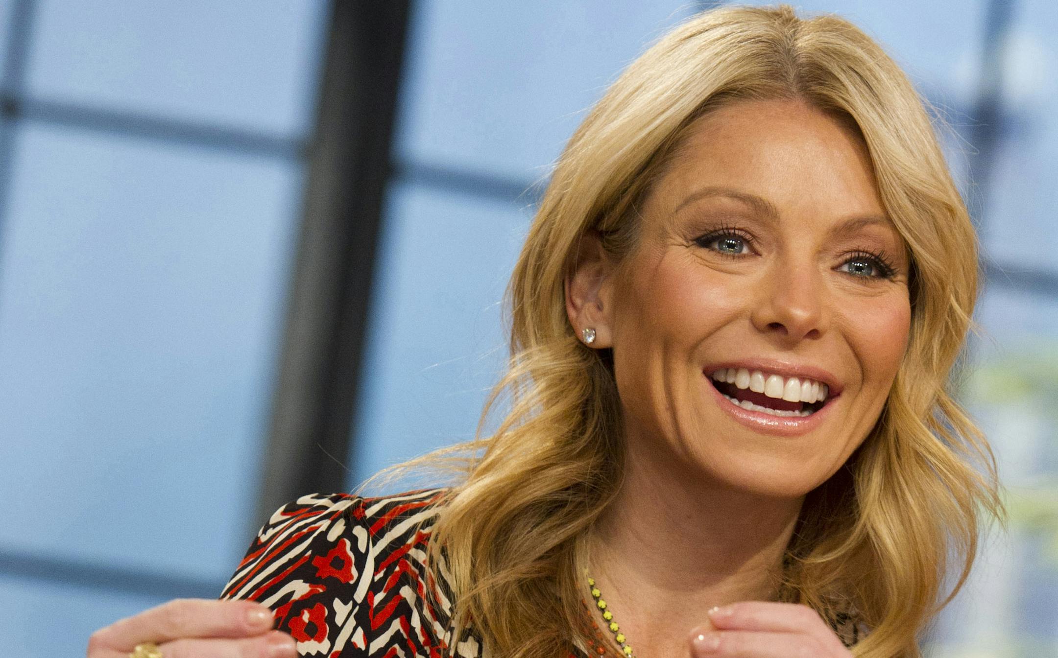 In this Jan. 24, 2012 photo, Kelly Ripa tapes an episode of "Live! with Kelly," in New York. The producers of ìLive! With Kellyî say a new co-host will be revealed on the show Sept. 4. Ripa that morning will officially announce her new partner as he or she joins her on stage. By then, Ripa will have welcomed 59 guest co-hosts since Regis Philbin retired from the show last November, Disney-ABC Domestic Television said Monday, Aug. 20, 2012. The chosen one will come for that large pack,