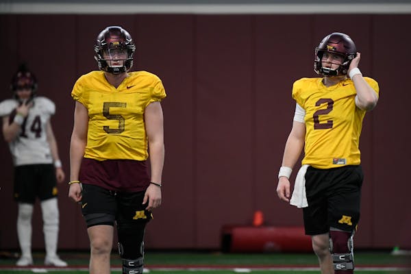 Gophers quarterbacks Zack Annexstad (5) and Tanner Morgan. With Annexstad's injury, Morgan becomes the likely starter.